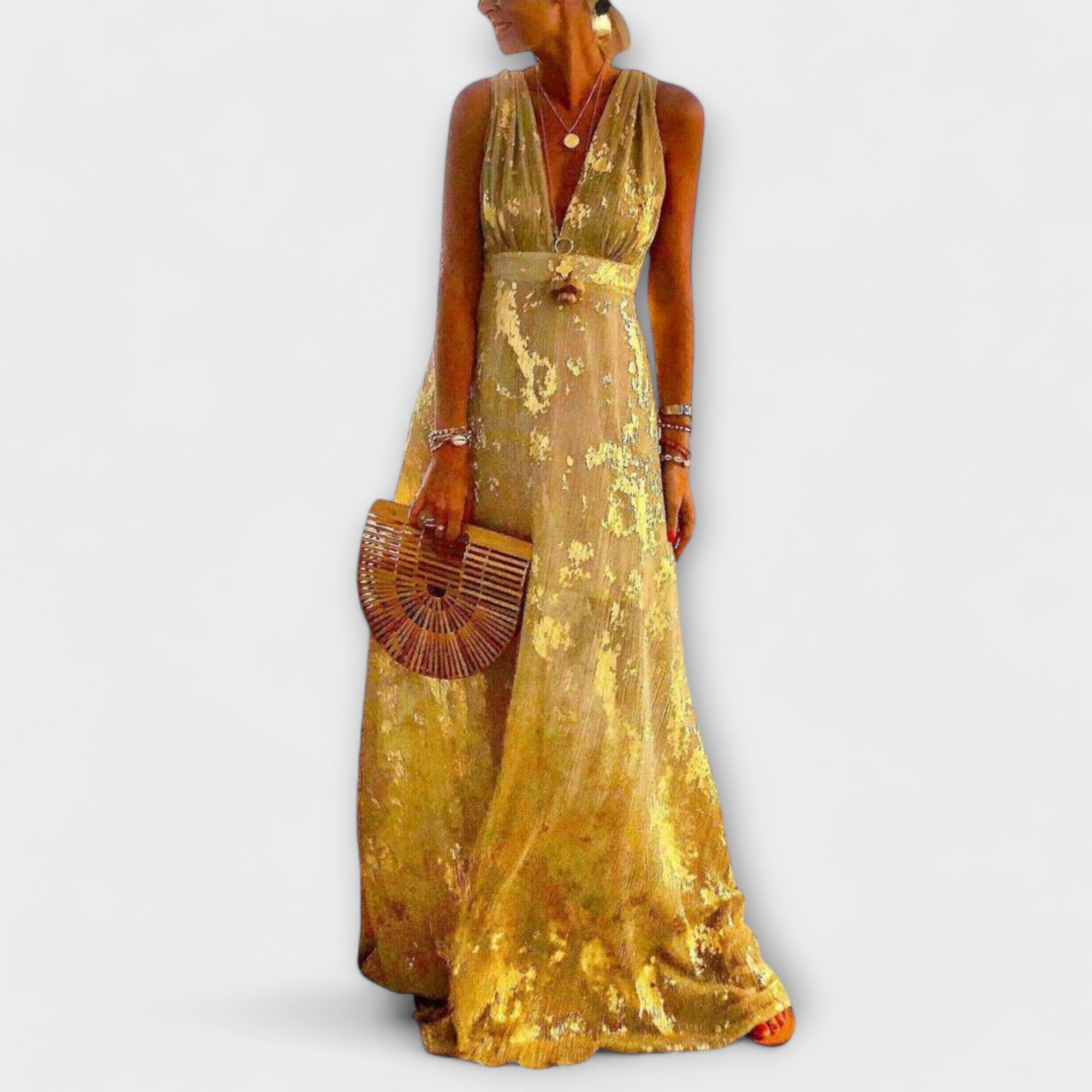 Vestido fluido com decote em V e detalhes em paetês