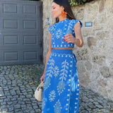 Maria - Conjunto estampado de top sem mangas e saia fluida