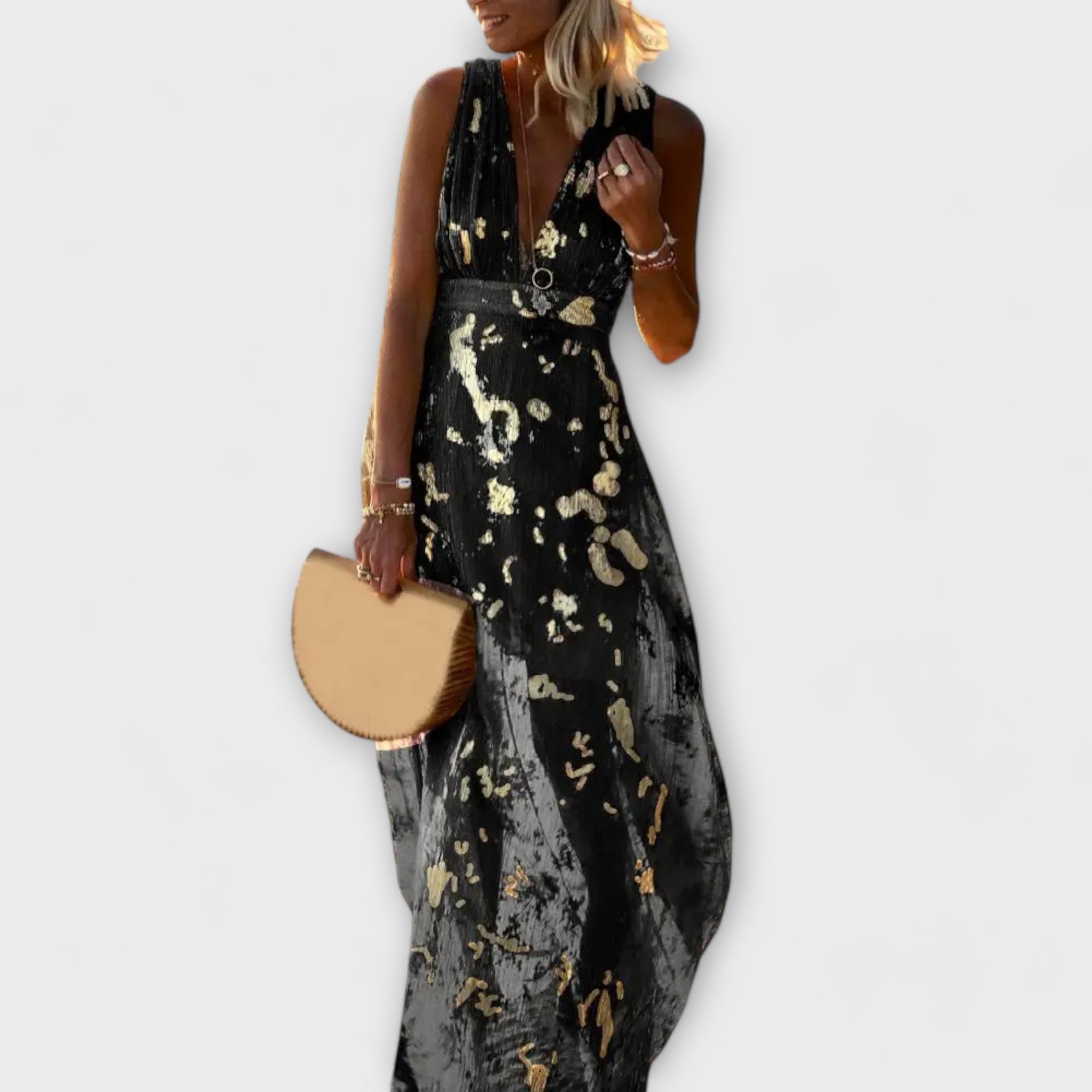 Vestido fluido com decote em V e detalhes em paetês