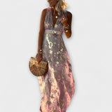 Vestido fluido com decote em V e detalhes em paetês