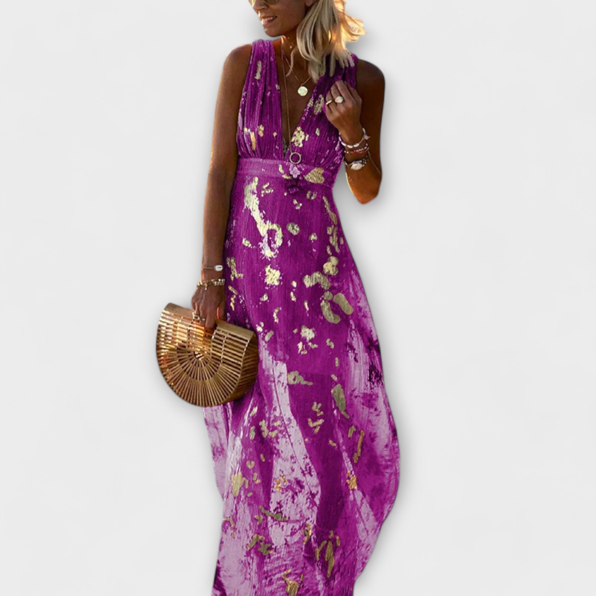 Vestido fluido com decote em V e detalhes em paetês