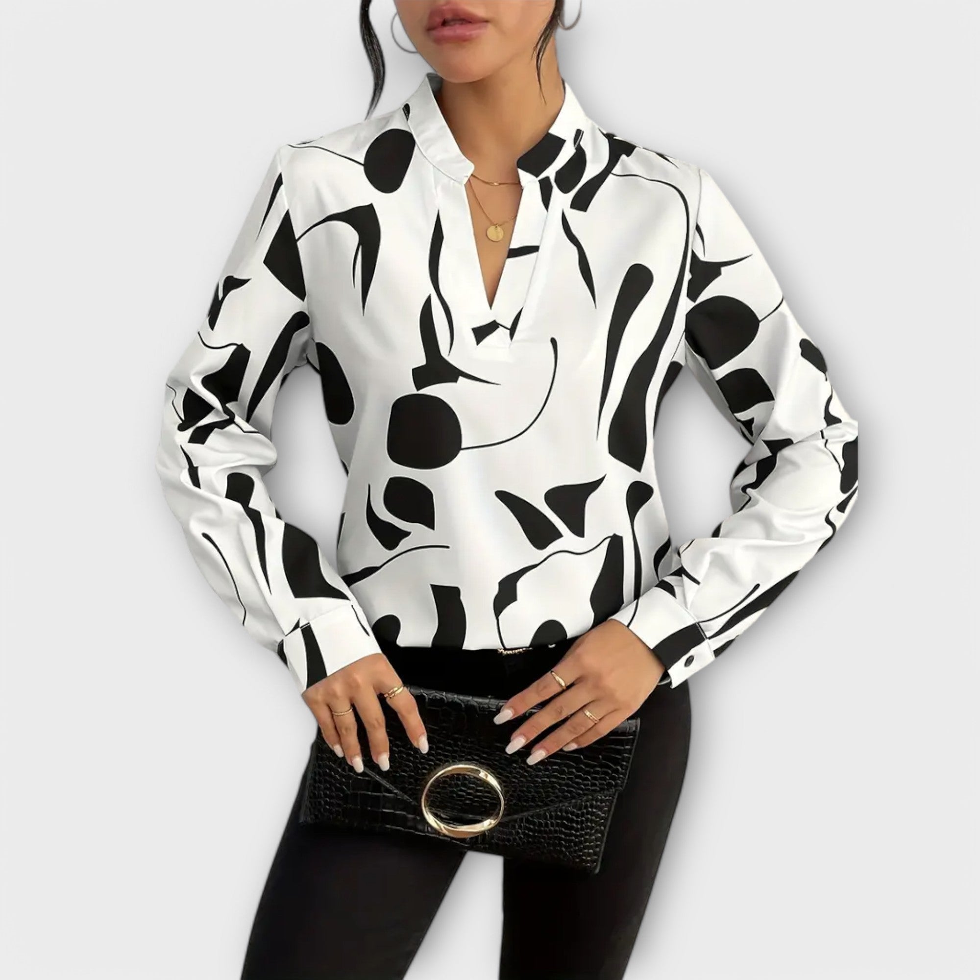 Blusa elegante com mangas longas e decote em V
